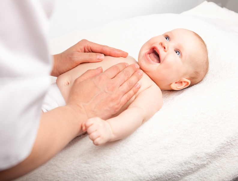 Three-month-baby-girl-is-receiving-chest-massage